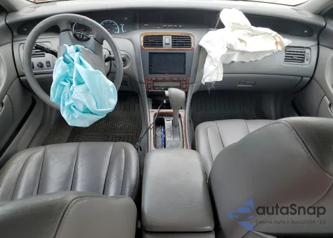 2000 Toyota Avalon Xl z USA, uszkodzony, nr VIN 4T1BF28B2YU084413